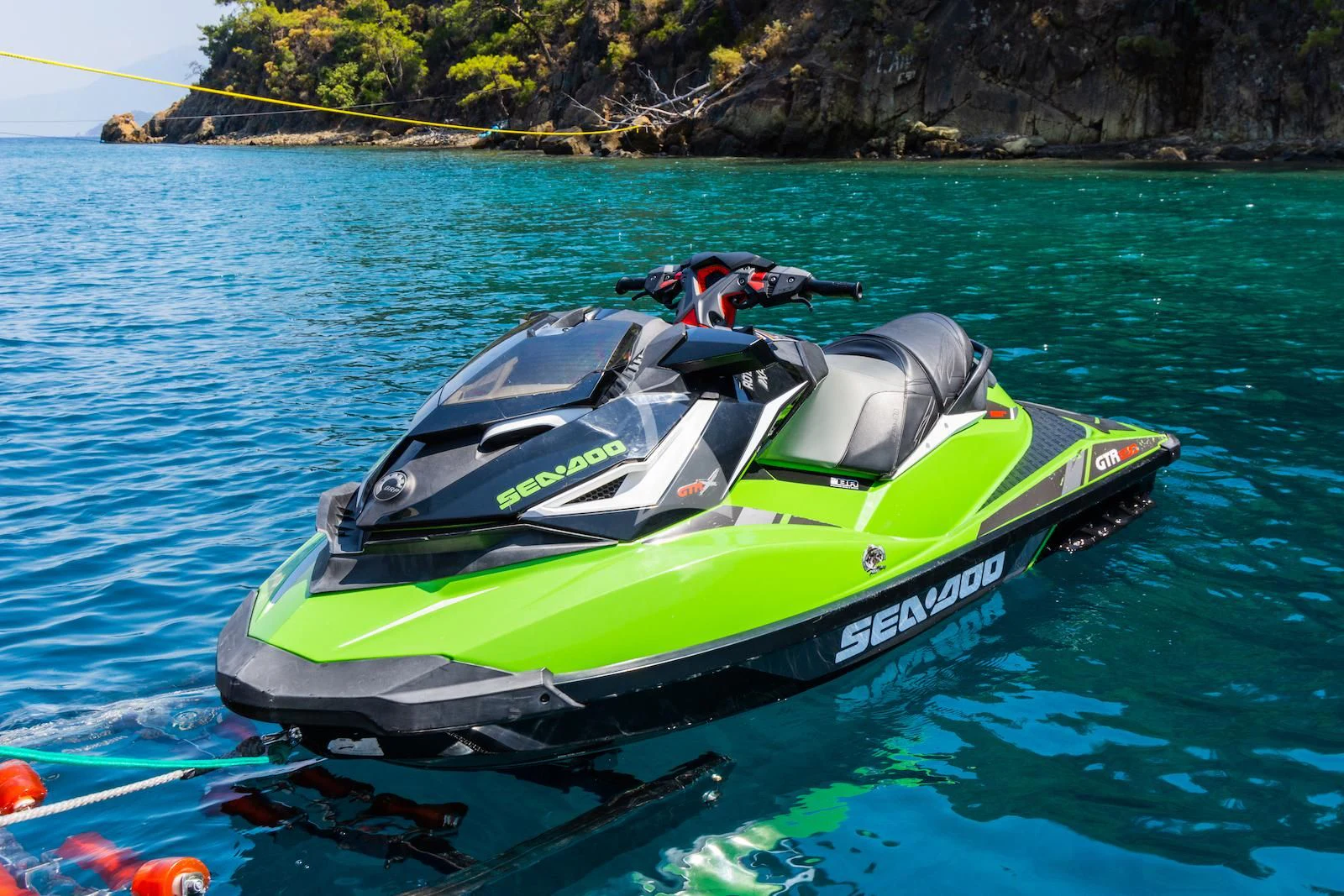 a car in the water aboard TAKARA ONE Yacht for Charter