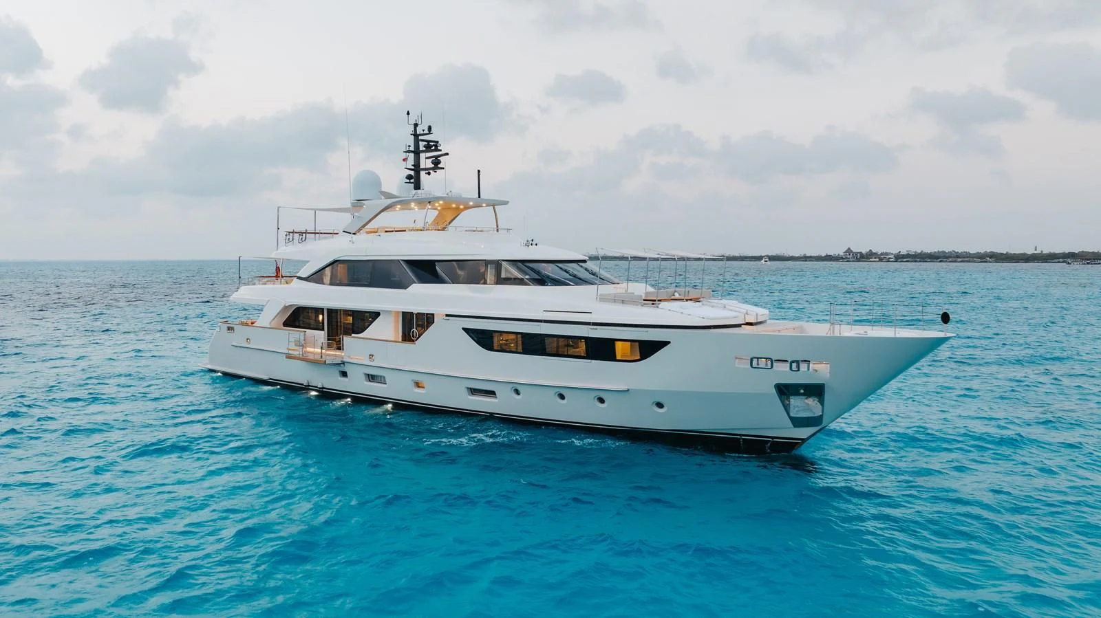 a white boat in the water aboard TAKARA ONE Yacht for Charter