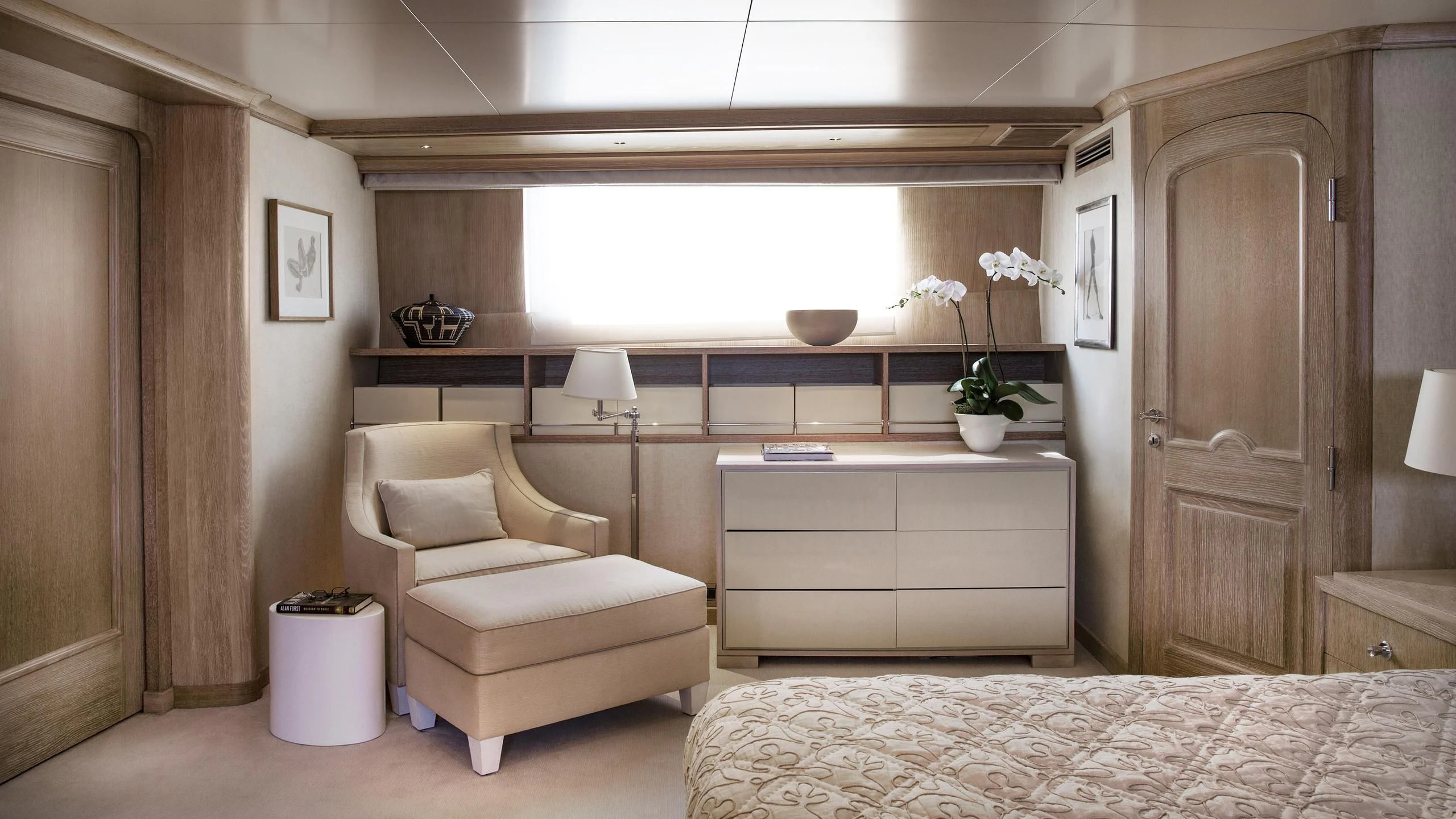 a room with a bed and a desk aboard NATALIA V Yacht for Sale