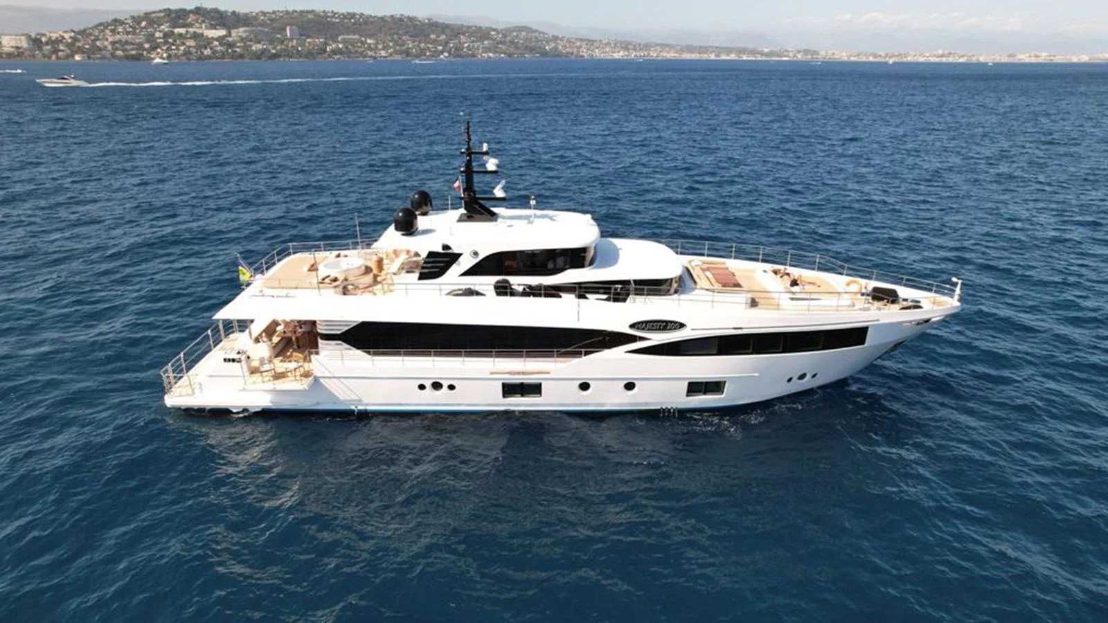 a white yacht in the water aboard CAROBELLE Yacht for Sale