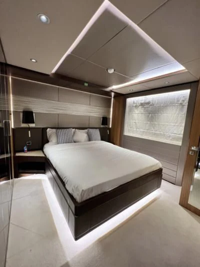 a bed in a room aboard CAROBELLE Yacht for Sale
