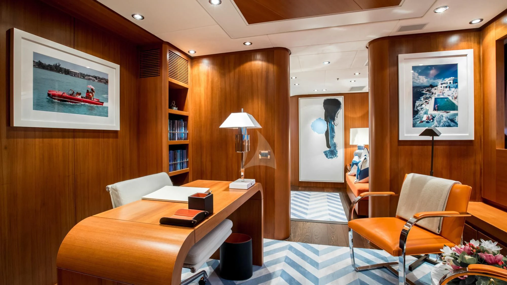 a room with a desk and a chair aboard SARON Yacht for Sale