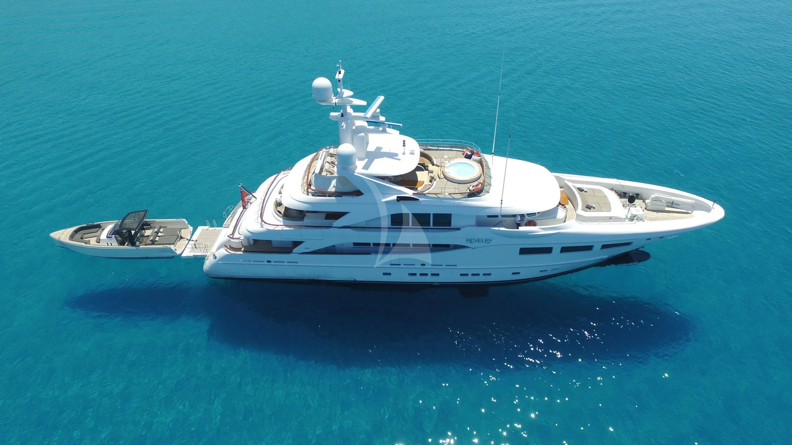 a white yacht in the ocean aboard SARON Yacht for Sale