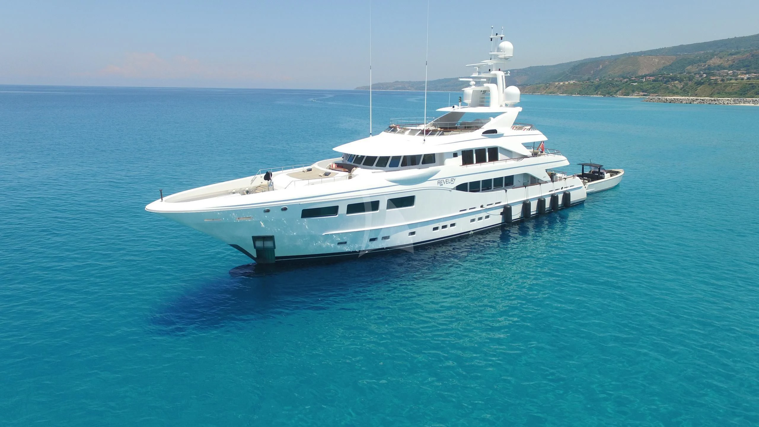a white yacht in the water aboard SARON Yacht for Sale