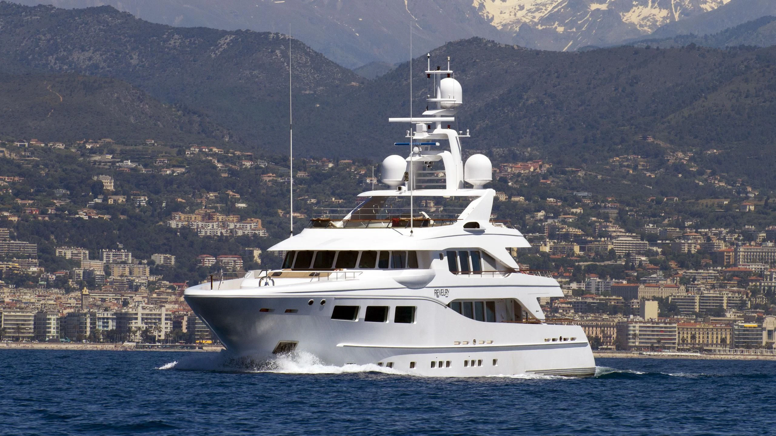 a white boat in the water aboard SARON Yacht for Sale