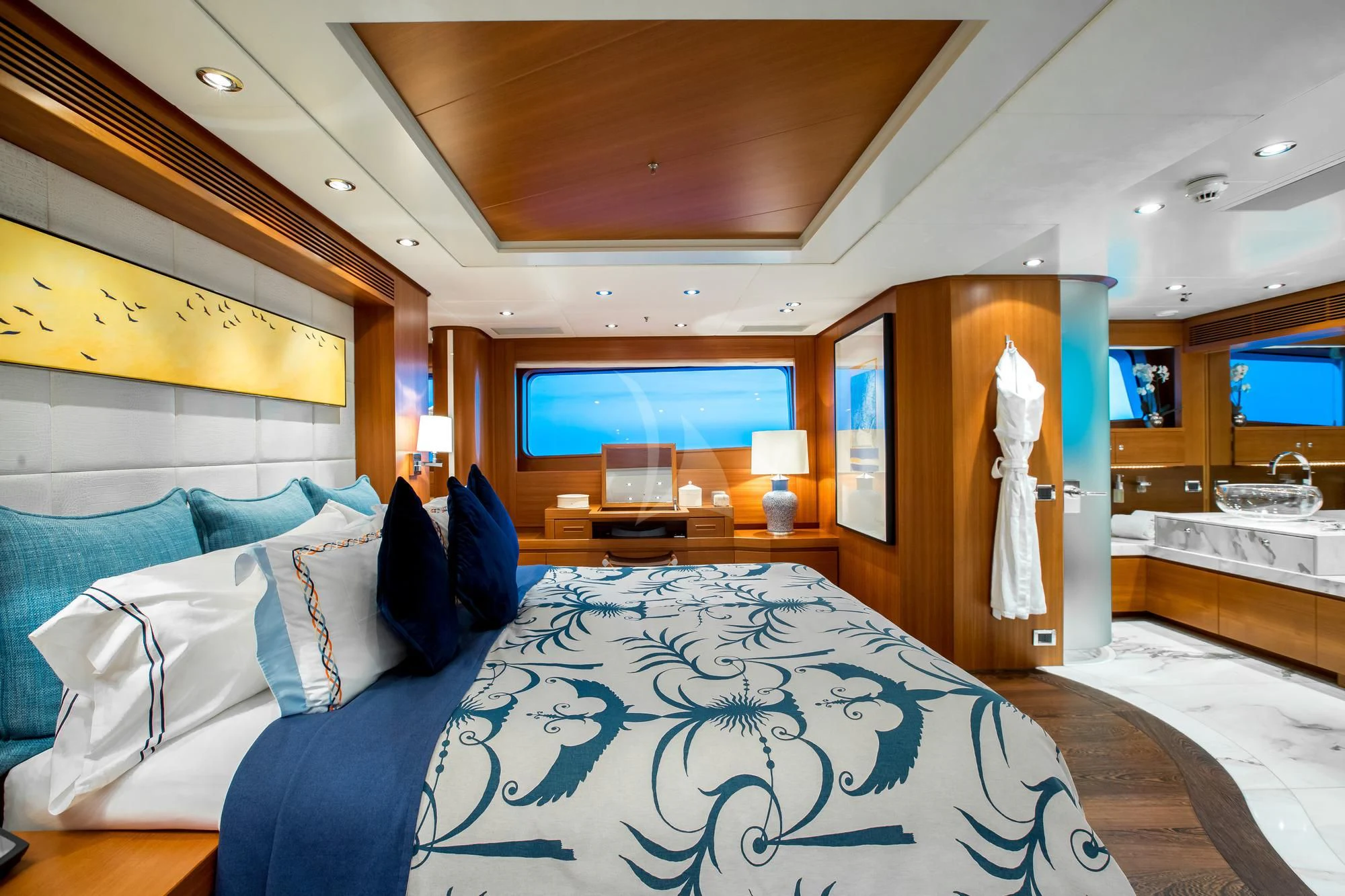 a bedroom with a large bed aboard SARON Yacht for Sale
