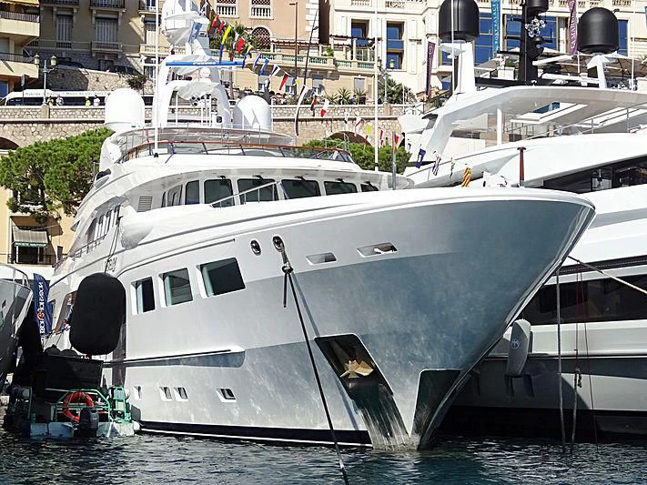 a boat docked in a harbor aboard SARON Yacht for Sale
