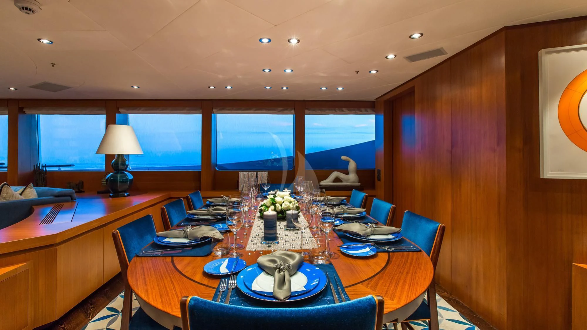 a dining room with a table and chairs aboard SARON Yacht for Sale