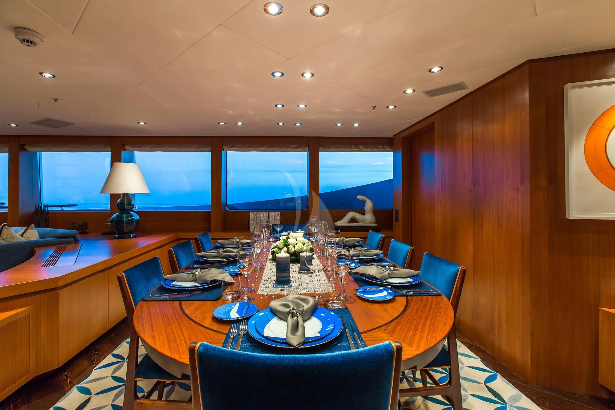 a room with a table and chairs aboard SARON Yacht for Sale