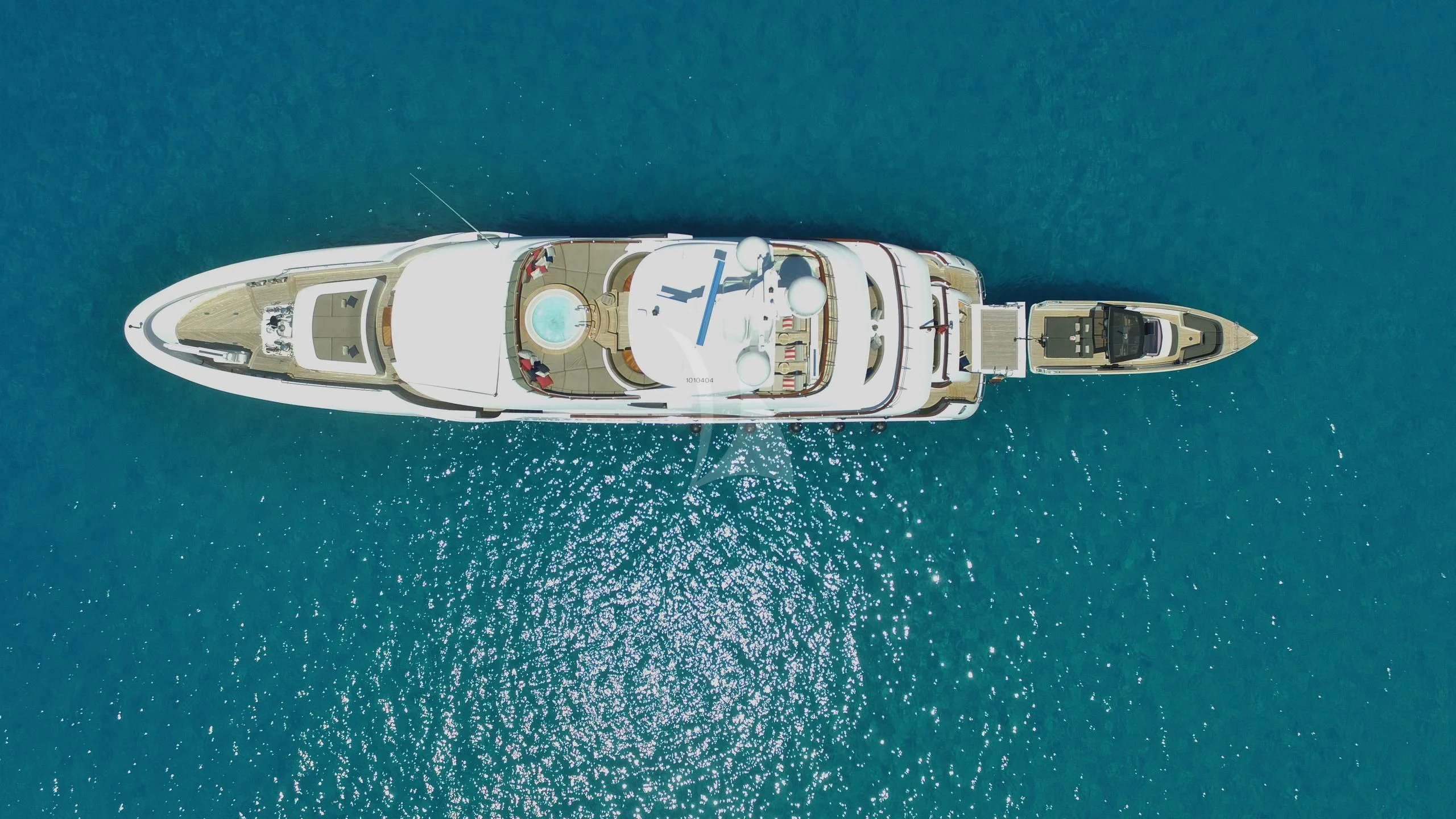 a silver and gold object with a logo on it aboard SARON Yacht for Sale