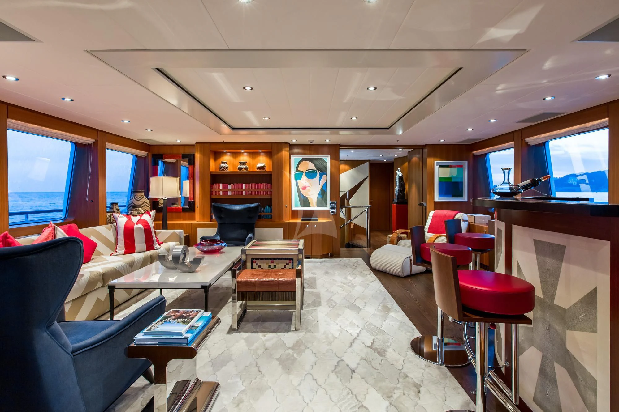 a living room with a large mirror aboard SARON Yacht for Sale