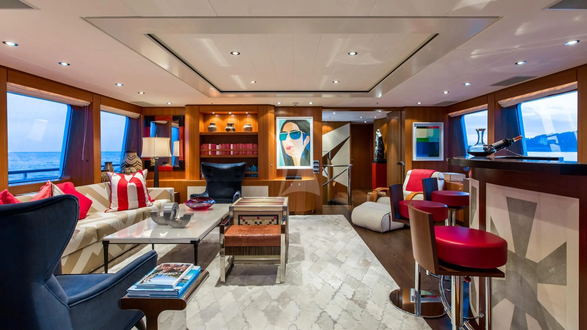 a living room with a large mirror aboard SARON Yacht for Sale