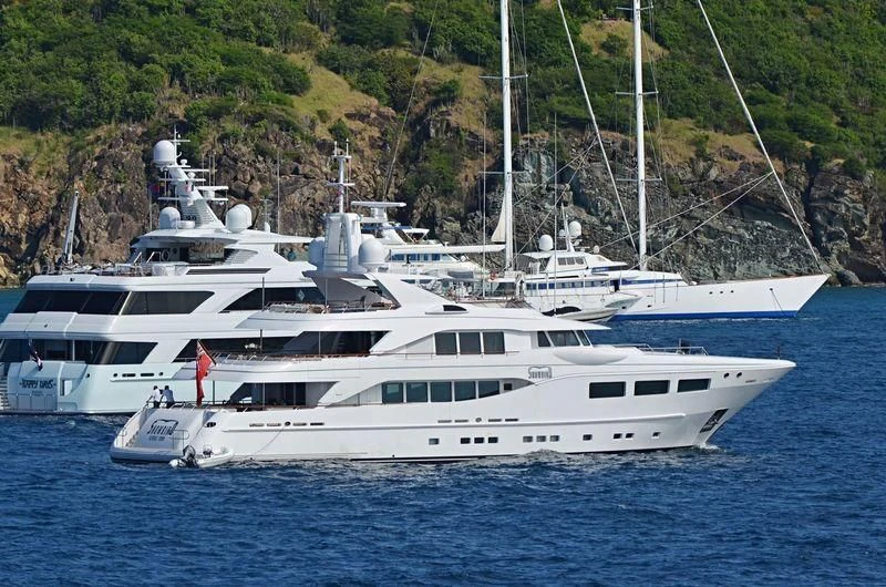 a white yacht on the water aboard SARON Yacht for Sale