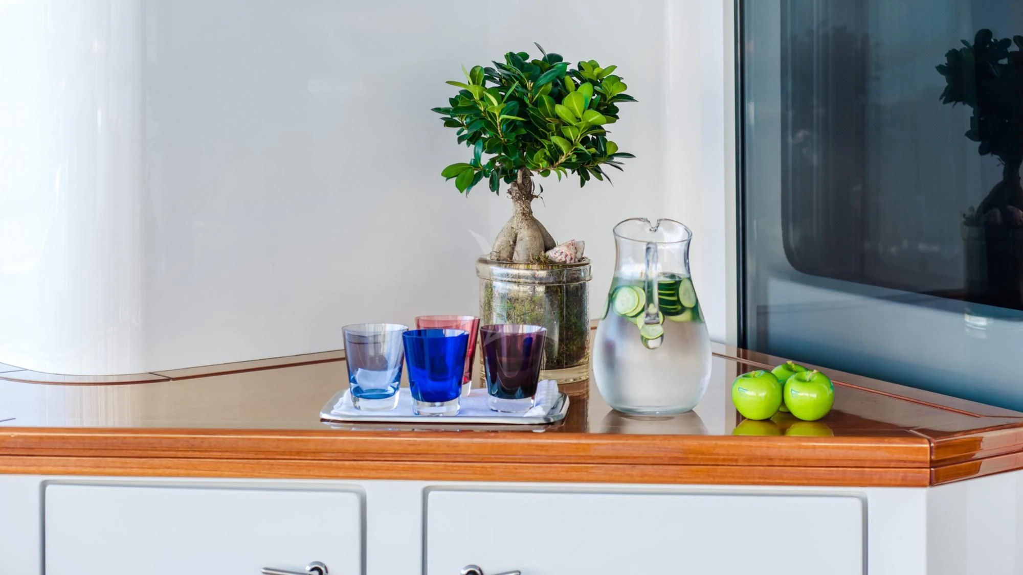 a plant in a glass vase aboard SARON Yacht for Sale