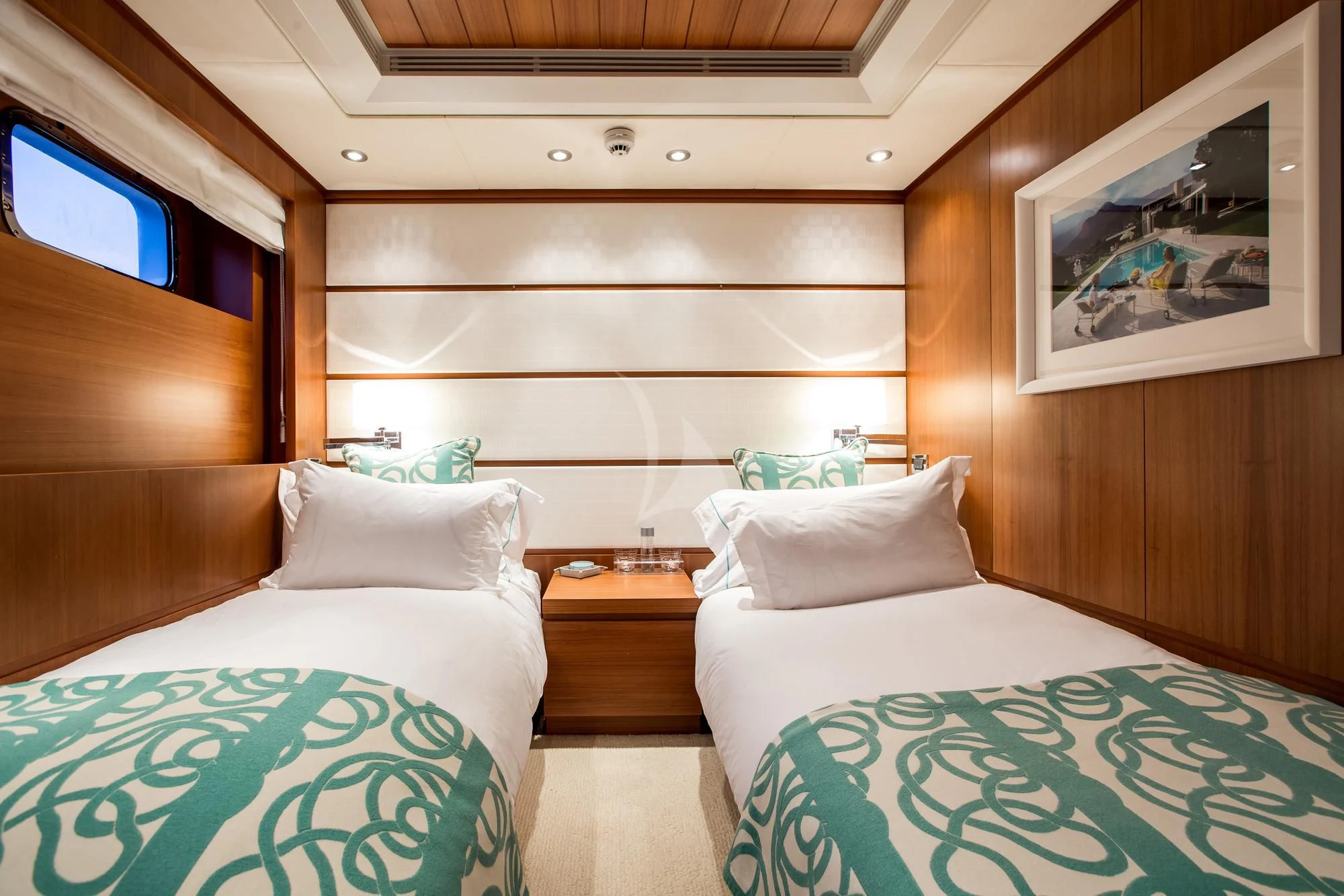 a room with a couple of beds aboard SARON Yacht for Sale