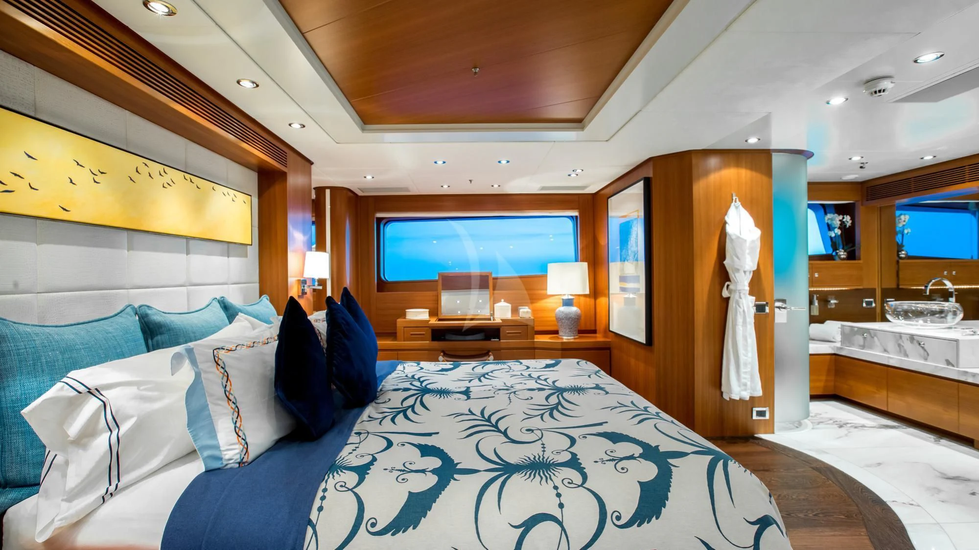 a large bed in a room aboard SARON Yacht for Sale