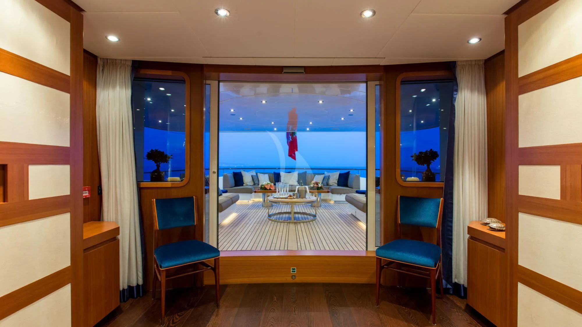 a room with a view of the ocean and a large window aboard SARON Yacht for Sale