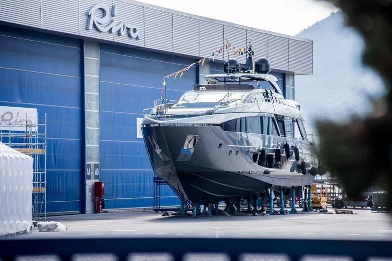 a large boat on a dock aboard FATIMA Yacht for Sale