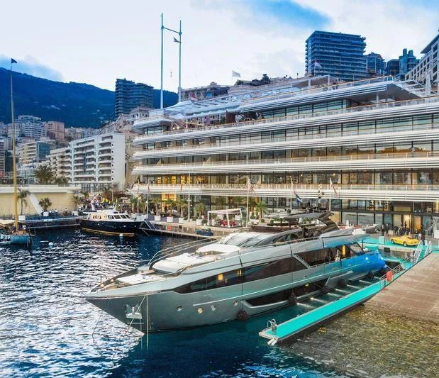 a large cruise ship docked aboard FATIMA Yacht for Sale