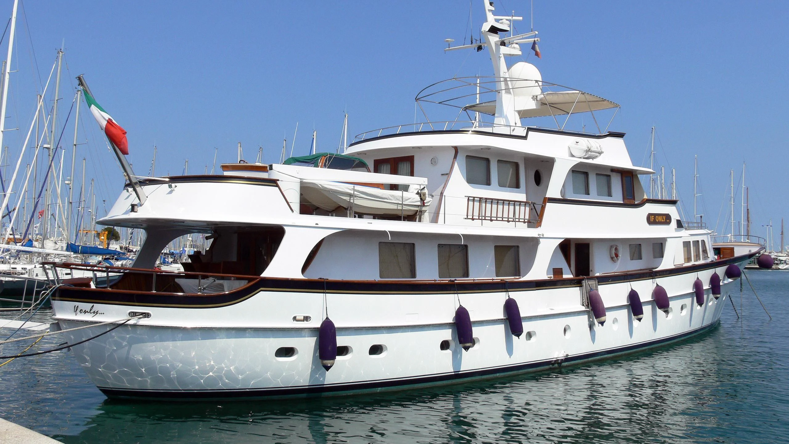 a boat on the water aboard IF ONLY Yacht for Sale