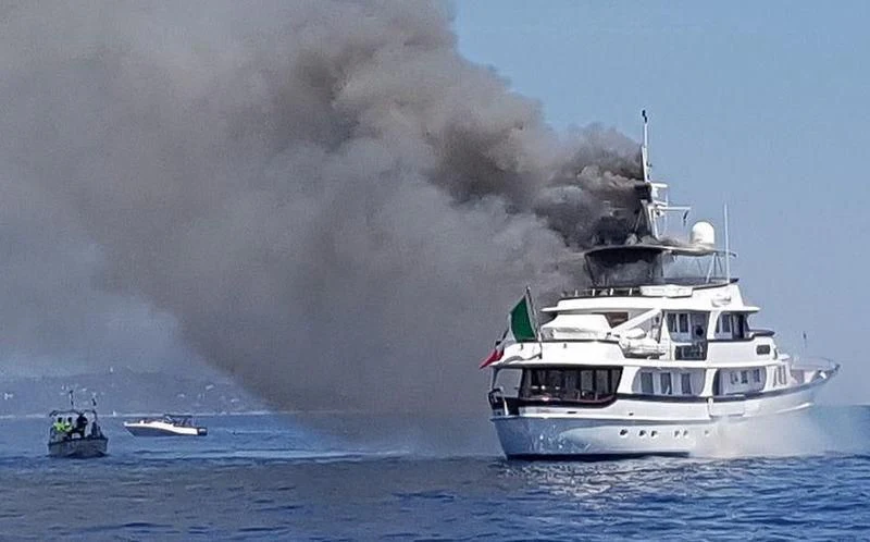 a boat in the water aboard IF ONLY Yacht for Sale