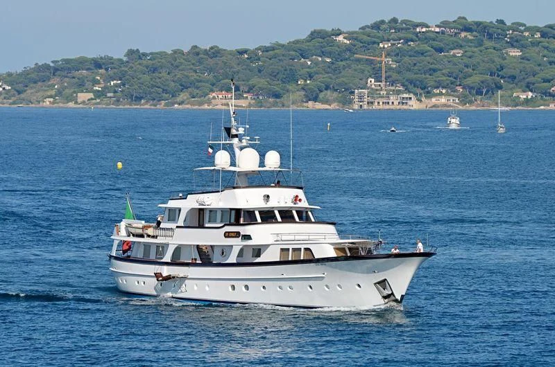 a white boat in the water aboard IF ONLY Yacht for Sale