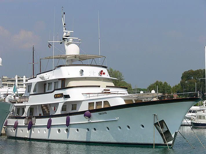 a large white boat aboard IF ONLY Yacht for Sale