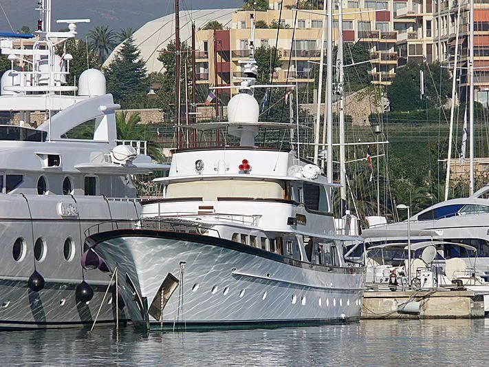 a group of boats are parked in the water aboard IF ONLY Yacht for Sale