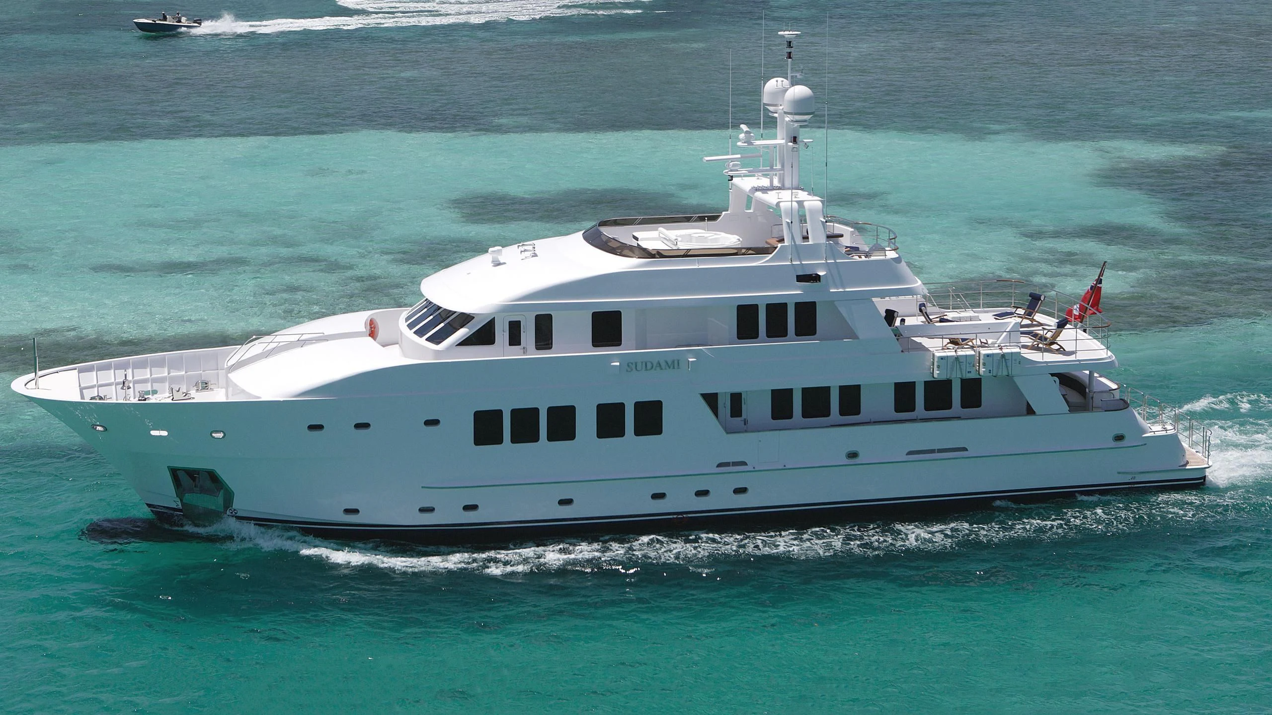a white yacht in the water aboard IF ONLY Yacht for Sale
