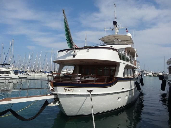 a boat in the water aboard IF ONLY Yacht for Sale