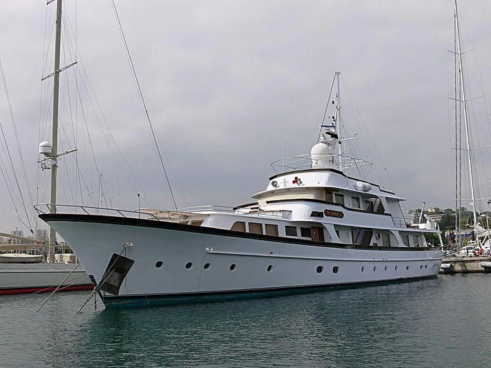 a large white boat in the water aboard IF ONLY Yacht for Sale