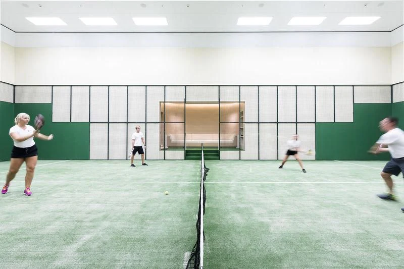 a group of people playing tennis aboard AVIVA Yacht for Sale