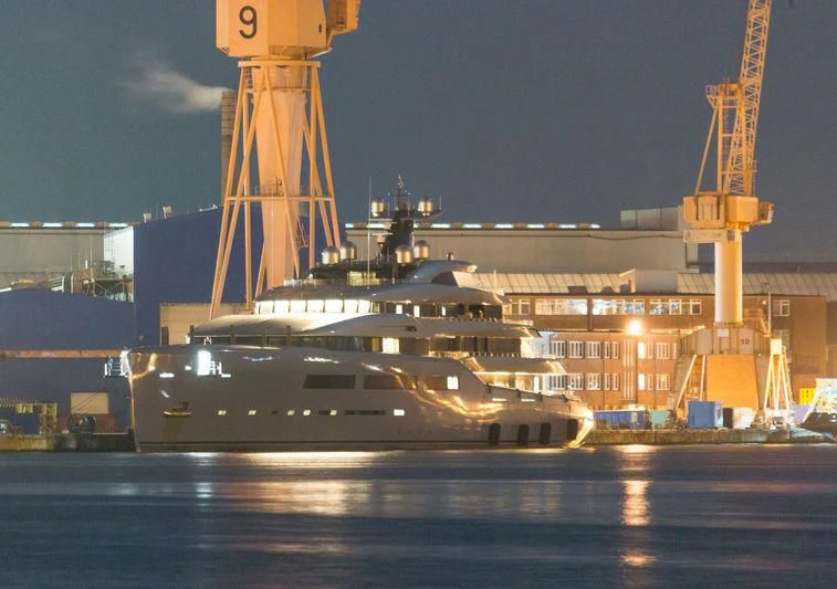 a large ship in a harbor aboard AVIVA Yacht for Sale