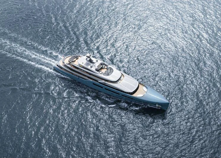 a cell phone on a blue fabric aboard AVIVA Yacht for Sale