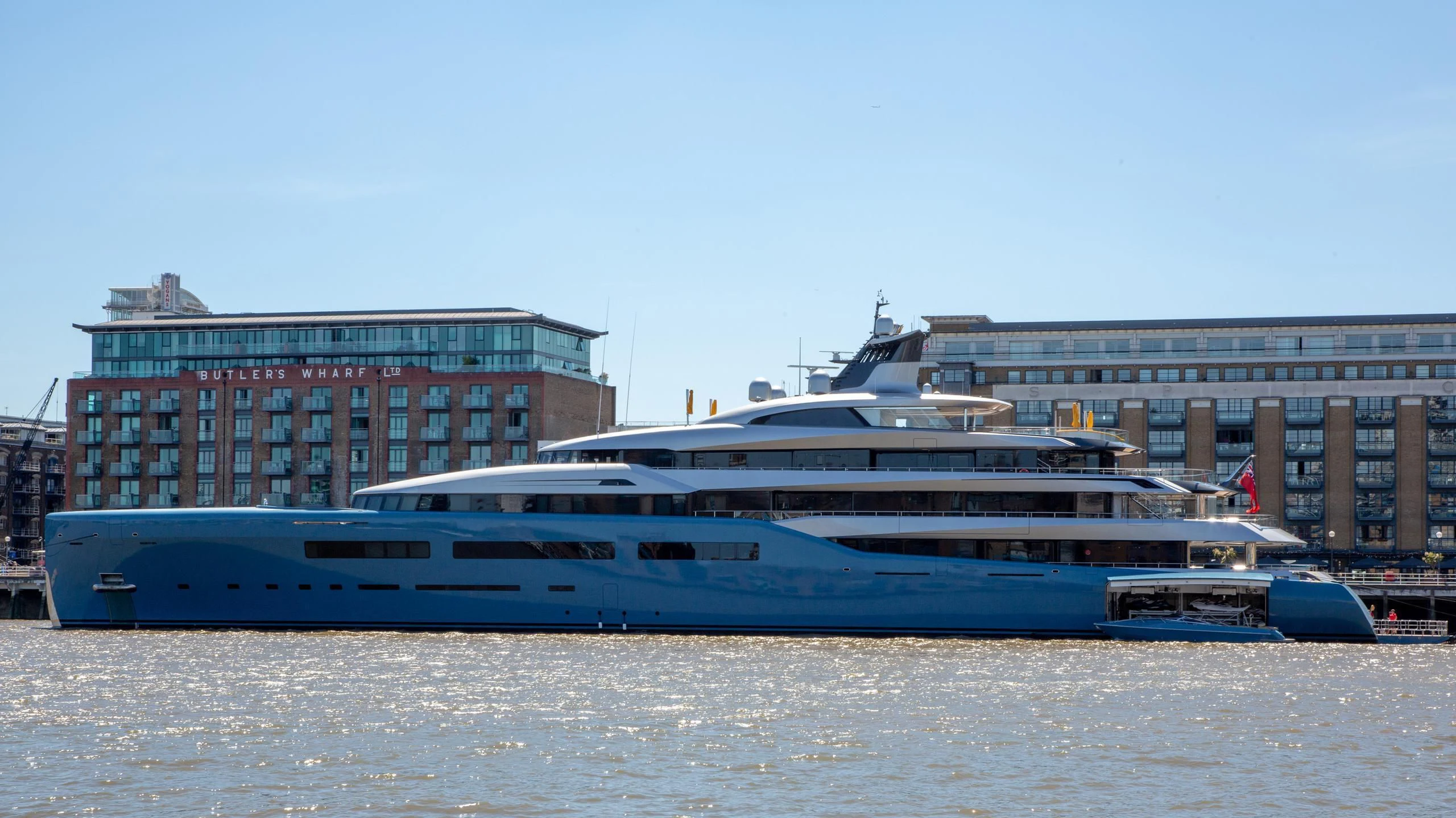 a large boat in a harbor aboard AVIVA Yacht for Sale