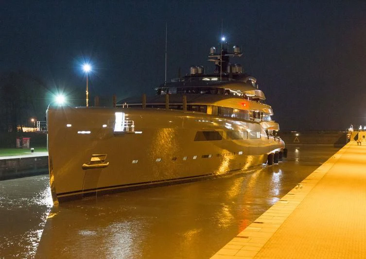 a large ship at night aboard AVIVA Yacht for Sale