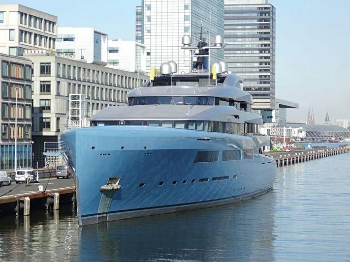 a large boat in a harbor aboard AVIVA Yacht for Sale