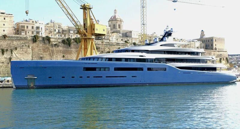 a large white boat in the water aboard AVIVA Yacht for Sale