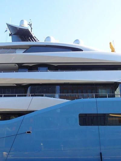 a large boat with a satellite dish on the roof aboard AVIVA Yacht for Sale
