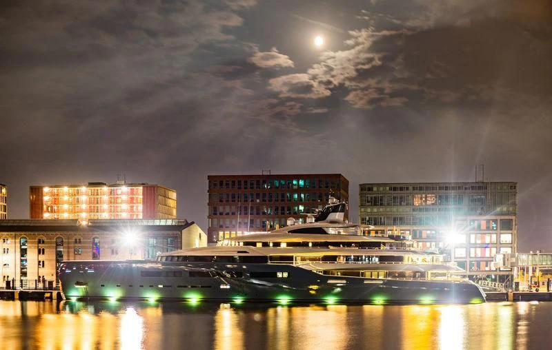 a city with buildings and lights aboard AVIVA Yacht for Sale