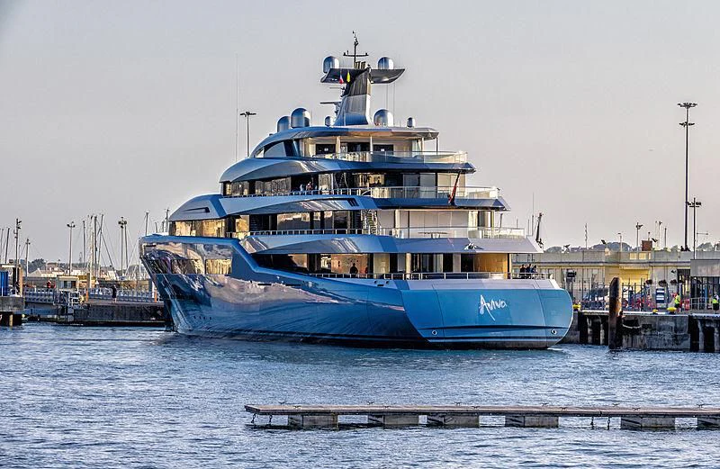 a large blue and yellow boat aboard AVIVA Yacht for Sale
