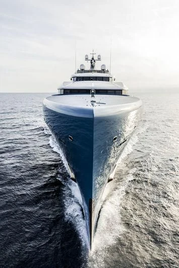 a white boat in the water aboard AVIVA Yacht for Sale