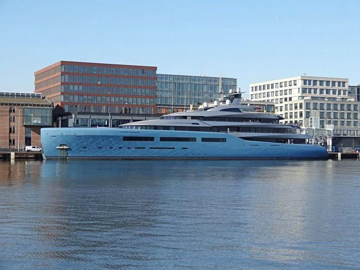 a large cruise ship in a harbor aboard AVIVA Yacht for Sale