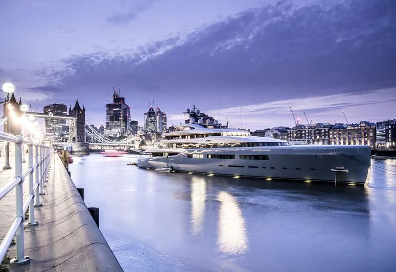 a large boat in a harbor aboard AVIVA Yacht for Sale