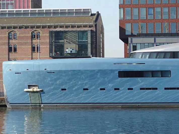 a large boat in a body of water aboard AVIVA Yacht for Sale
