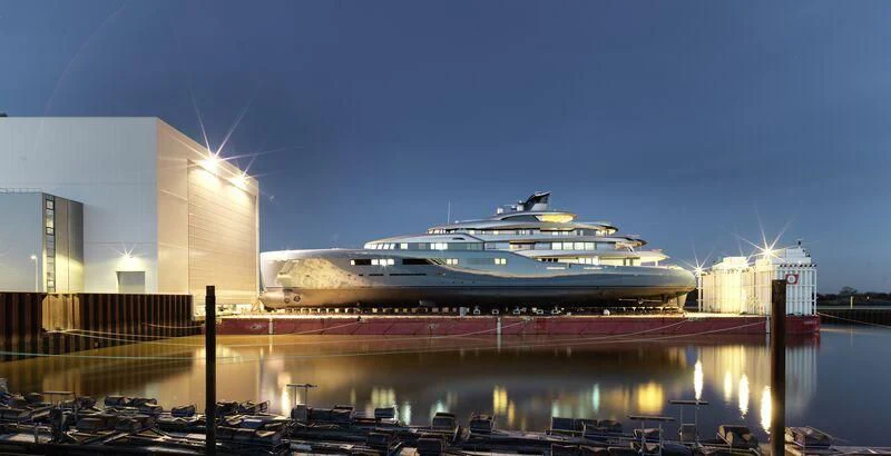 a cruise ship docked at a port aboard AVIVA Yacht for Sale