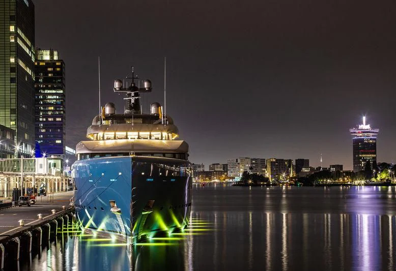 a large boat in a city aboard AVIVA Yacht for Sale