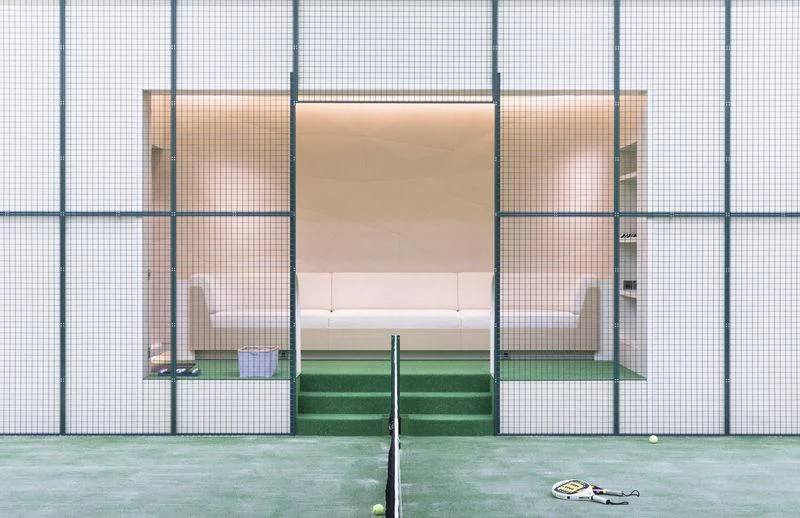 a tennis racket and a racket in a court aboard AVIVA Yacht for Sale