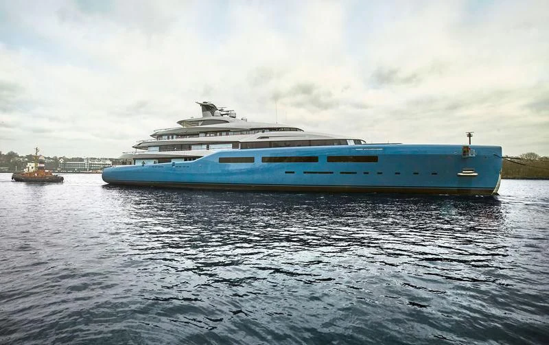 a large blue and white boat on the water aboard AVIVA Yacht for Sale