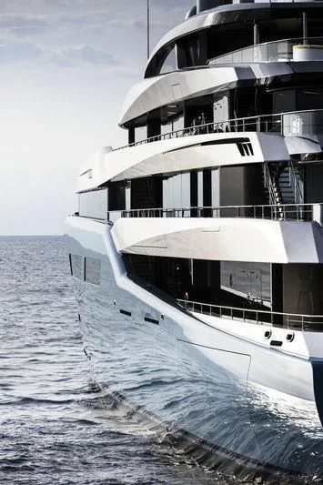 a large white boat on the water aboard AVIVA Yacht for Sale